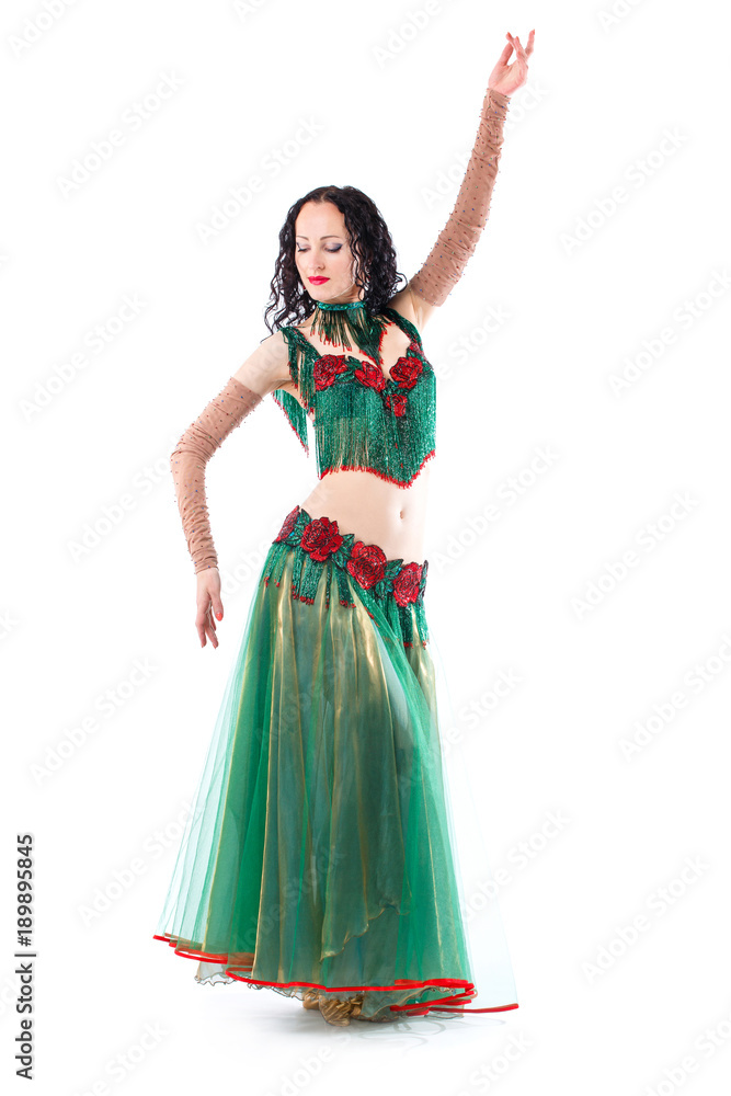 Beautiful Belly Dance girl in green baladi costume traditional dancing wear