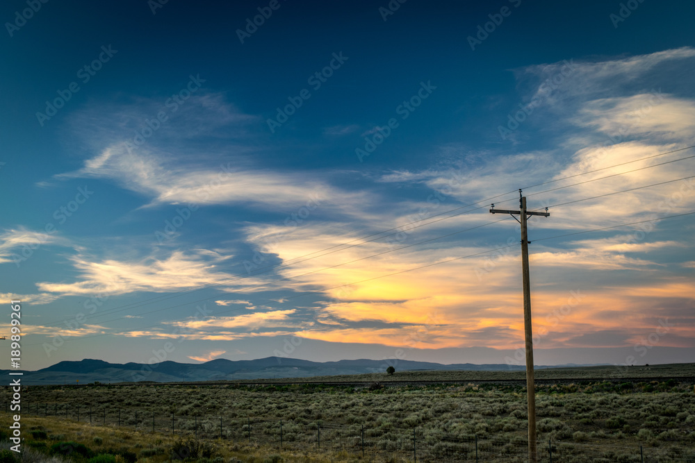 Obraz premium PHONE LINES AND MONTANA SUNSET