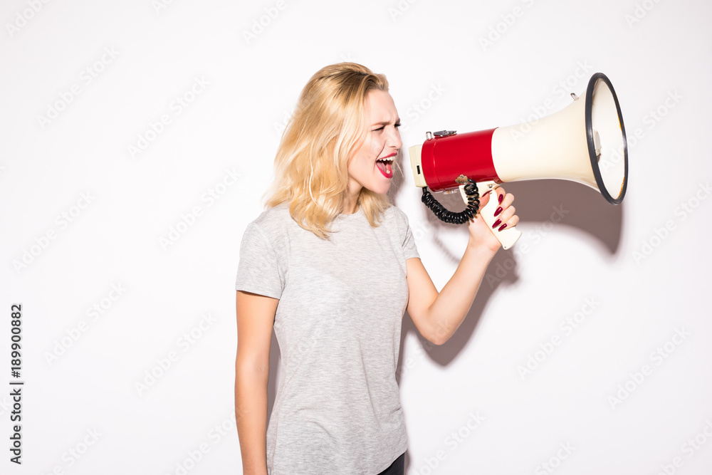 business, communication and office concept - screaming woman with megaphone isolated on white business, communication and office concept - screaming woman with megaphone isolated on white