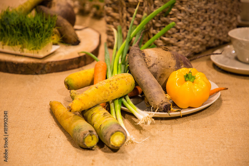 Vegetables served on the table, carrot, onion, beet and pepper