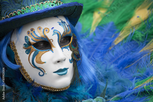 Colourful Venetian masks and costumes at Februay's yearly Venice Carnival, Italy