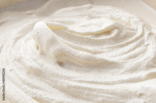 Whipped cream close-up textured background 
