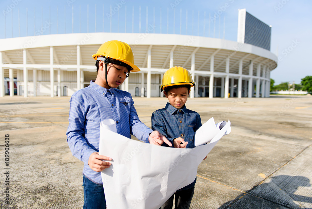Engineering Thai Asian boy in yellow helmet Engineering Thai Asian boy in yellow helmet