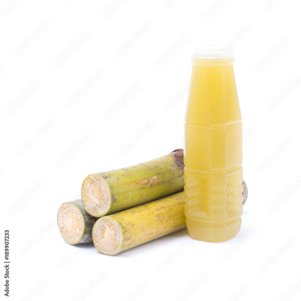 .segment sugar cane and sugar cane juice in plastic bottle isolated on white background.. .segment sugar cane and sugar cane juice in plastic bottle isolated on white background..