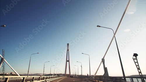 Driving along Russian bridge road. It is the world's longest cable-stayed bridge connecting the mainland part of Vladivostok with Russian Island. Russia photo