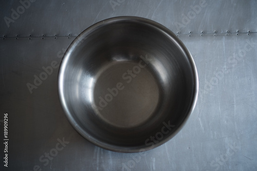 a stainless steel bowl, empty