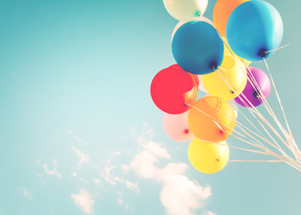 Colorful balloons done with a retro instagram filter effect. Concept of happy birth day in summer and wedding, honeymoon party use for background. Vintage color tone style