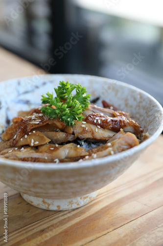 japanese food , Chicken teriyaki with rice on wood background