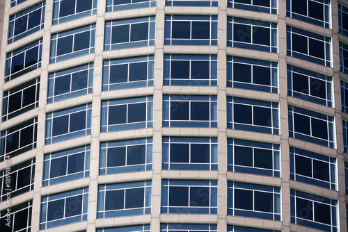 close up on windows and wall of office building
