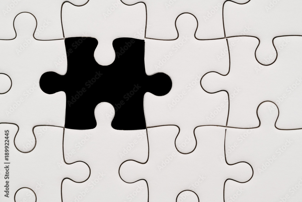 background of white jigsaw puzzle with missing piece background of white jigsaw puzzle with missing piece