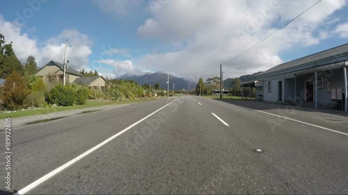 road view of car driving in route no.6 west coast of southland new zealand