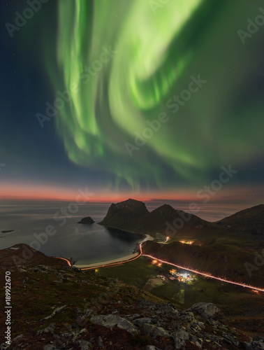 Vertical panoramic photo of Aurora Borealis (the Northern Lights) taken at Norwegian Lofoten shortly after the sunet. photo