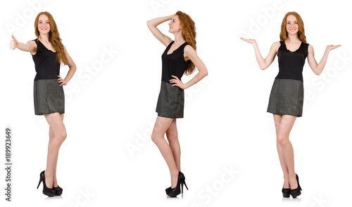 Photos Red hair girl in gray dress isolated on white