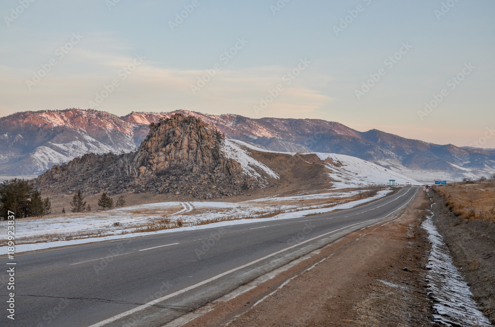 Baikal highway passing Sleeping Lion Mountain (Omulevaya hill)  Tarbagatay, Republic of Buryatia, Russia