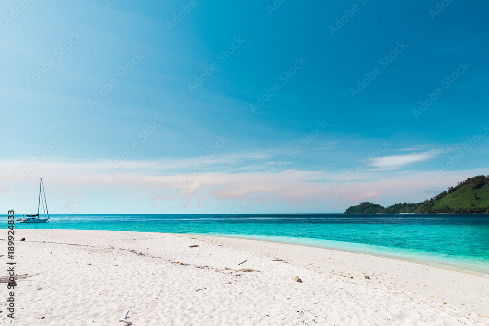 White sand beach with blue sky