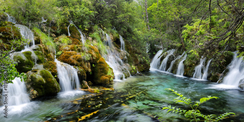 view of colorful lake and waterfall in jiuzhaigou national park  Sichuan  china