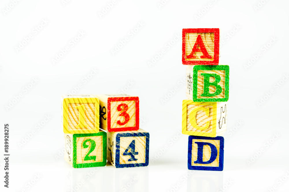 Close up arrangement of alphabet isolated on white background. Preschool, education concept or other your content. Close up arrangement of alphabet isolated on white background. Preschool, education concept or other your content.