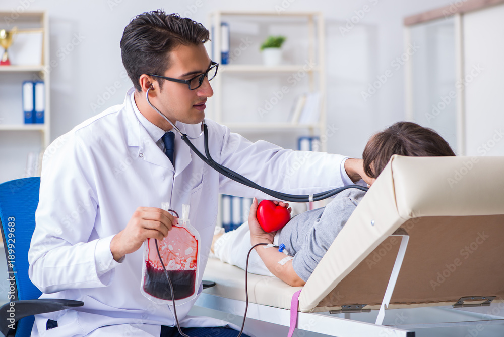 Patient getting blood transfusion in hospital clinic Patient getting blood transfusion in hospital clinic
