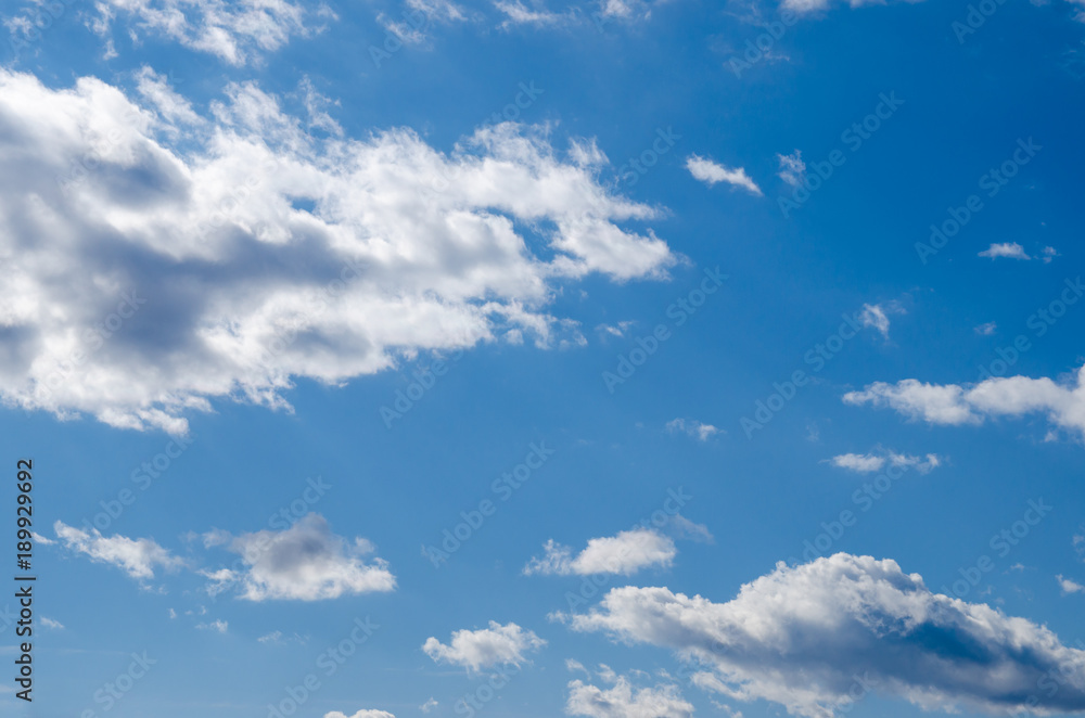 blue sky with stratocumulus and cumulus clouds on a day blue sky with stratocumulus and cumulus clouds on a day