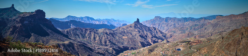 Mountainous landscape of Gran Canaria in Spain / Mountain peak of "Roque Bentaiga" next to mountain peak of "Roque Nublo"
