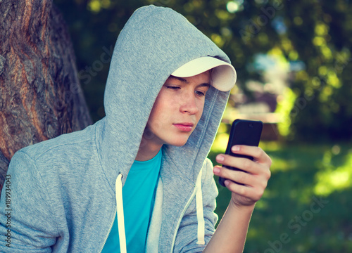 Teenager with a Phone