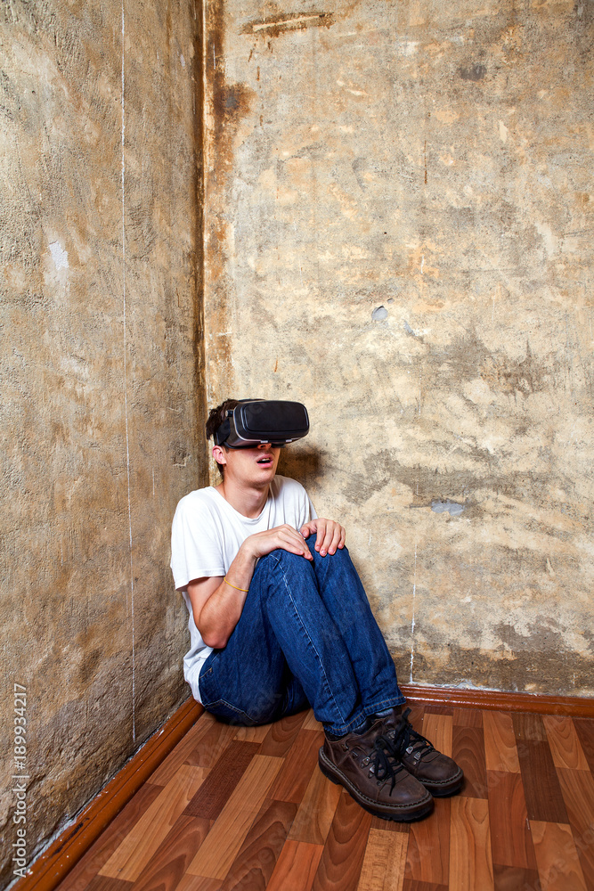 Young Man in VR Glasses