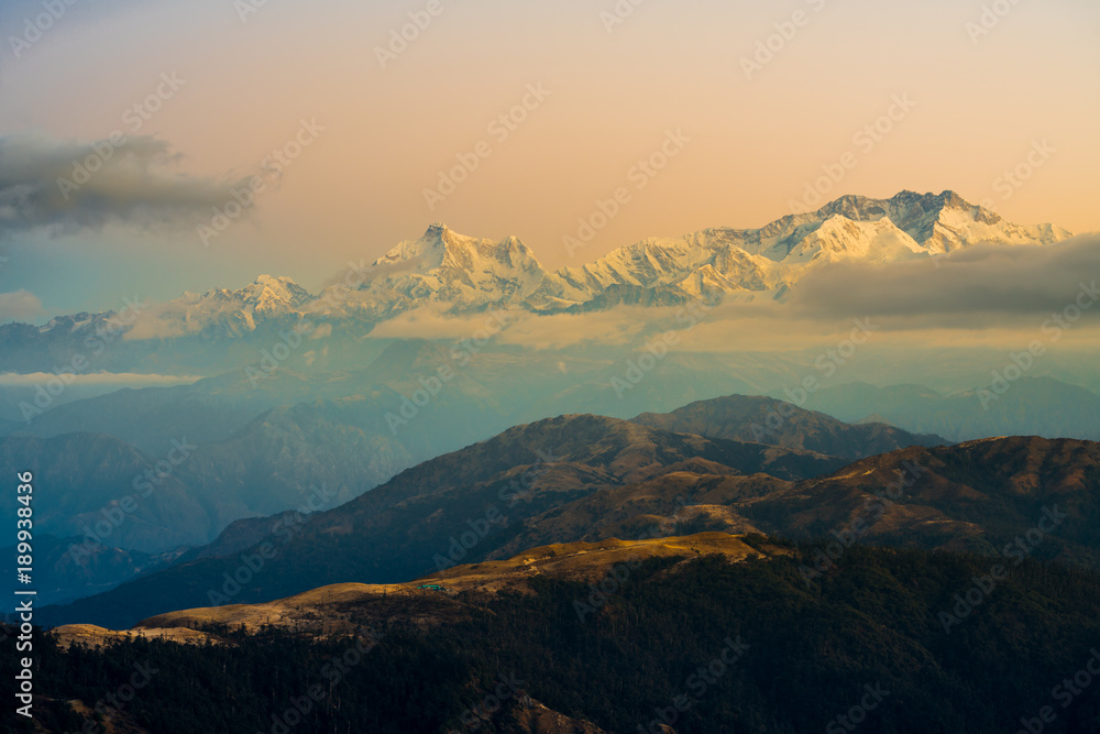 Dramatic landscape Kangchenjunga mountain with colorful from sunlight at Sandakphu