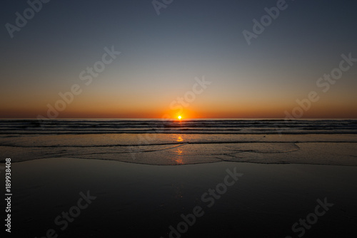 Beautiful sunset on the beach © Patrick