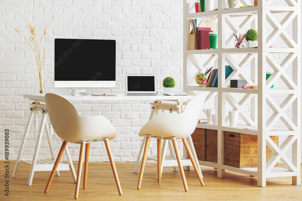 Fototapeta premium Industrial loft interior with workplace