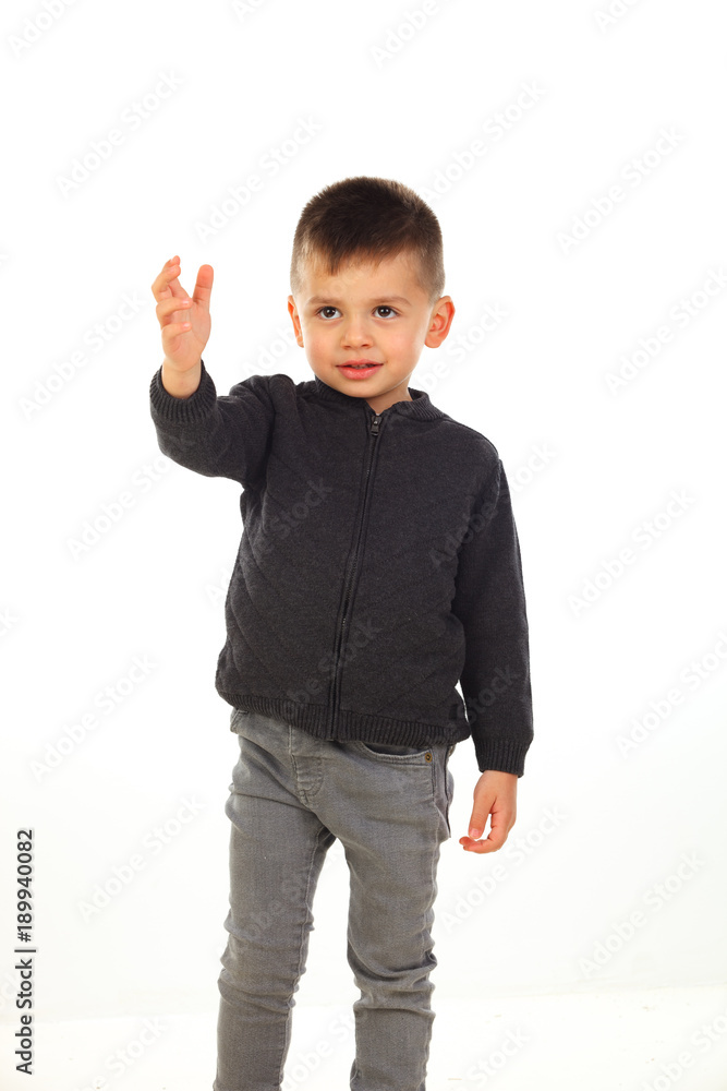 Beautiful child indicating something with his hand Beautiful child indicating something with his hand