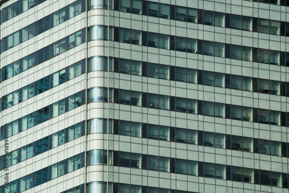 Glass facade of modern city high rise buildings Glass facade of modern city high rise buildings