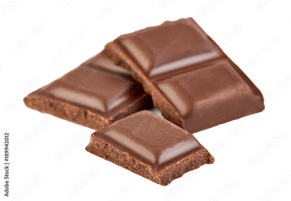 Milk chocolate pieces isolated on white background. Milk chocolate pieces isolated on white background.