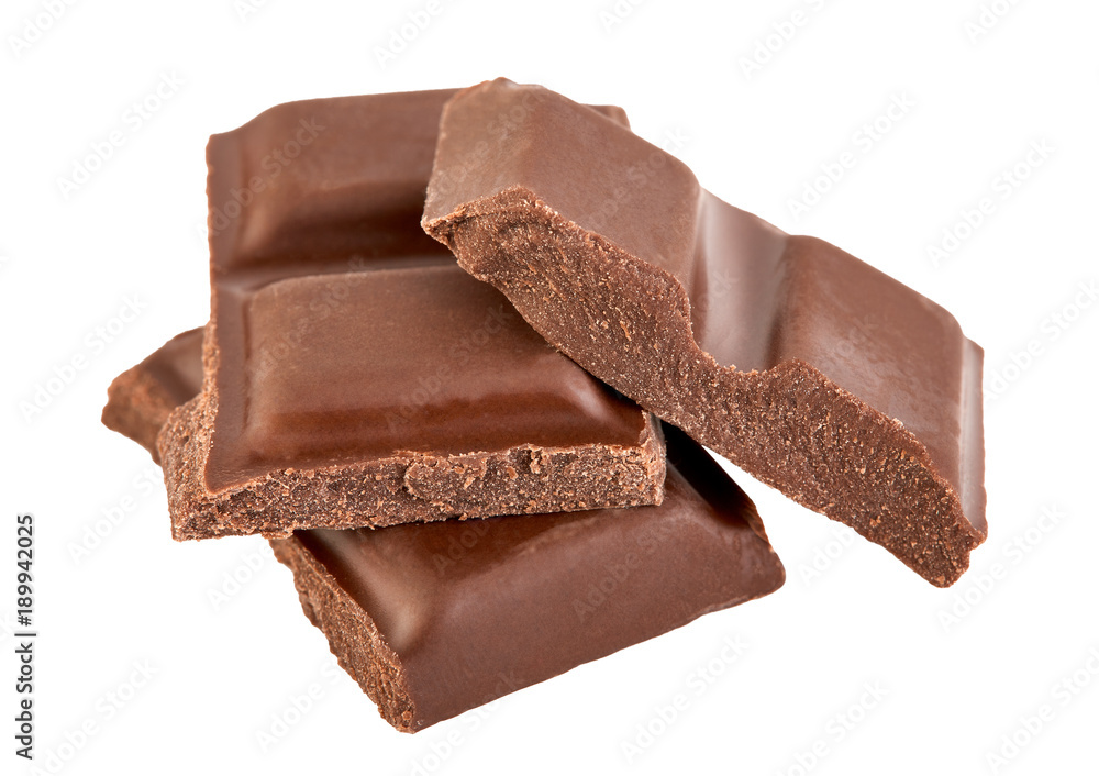 Milk chocolate pieces isolated on white background. Milk chocolate pieces isolated on white background.