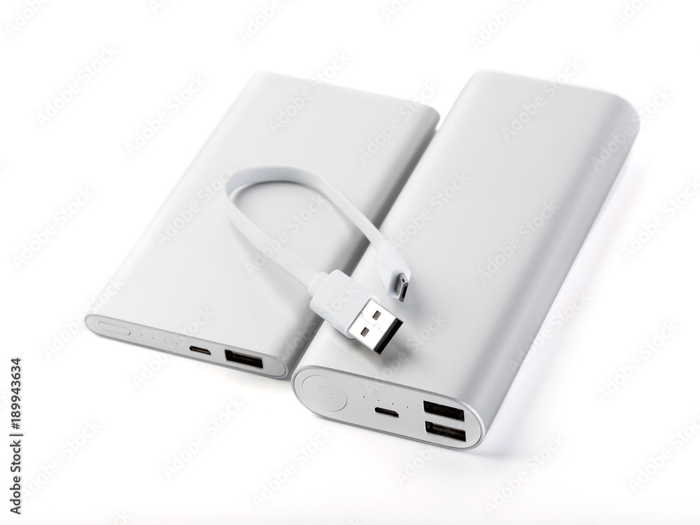 Power bank for charging mobile devices. White smart phone charger with power bank. battery bank. External battery for mobile devices. Power bank for charging mobile devices. White smart phone charger with power bank. battery bank. External battery for mobile devices.