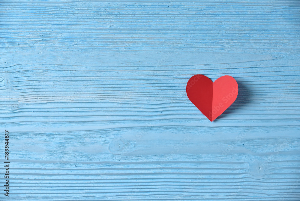 Red heart on blue wooden background. Red heart on blue wooden background.