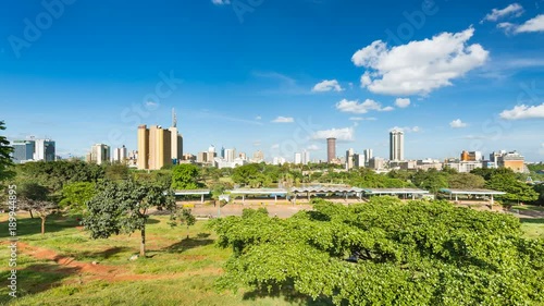 Timelapse sequence of the skyline of Nairobi, Kenya with Uhuru Park in the foreground in 4K photo