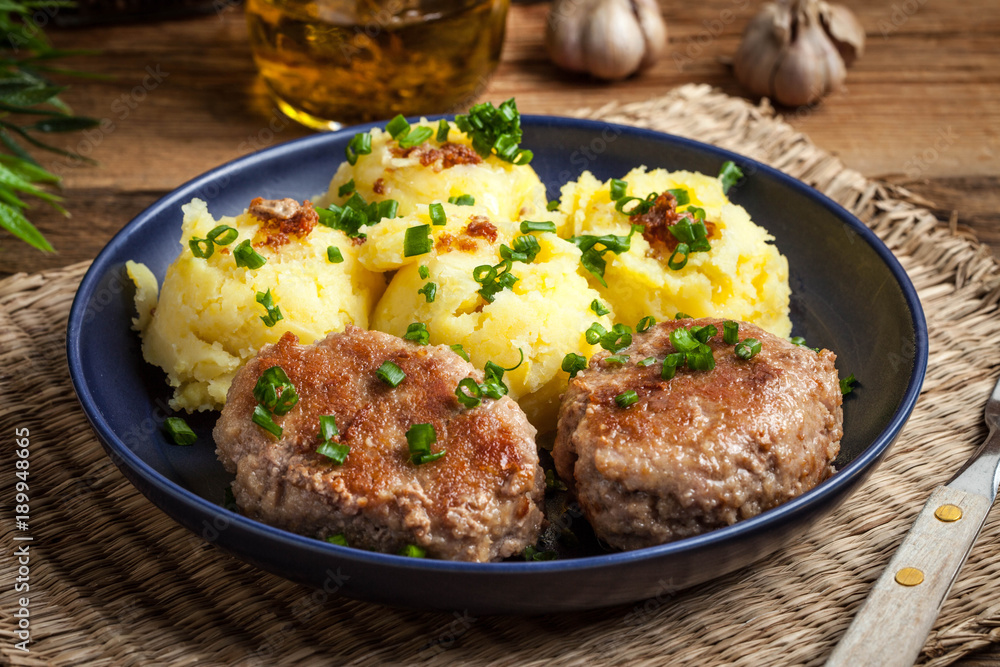 Meatballs served with boiled potatoes. Meatballs served with boiled potatoes.