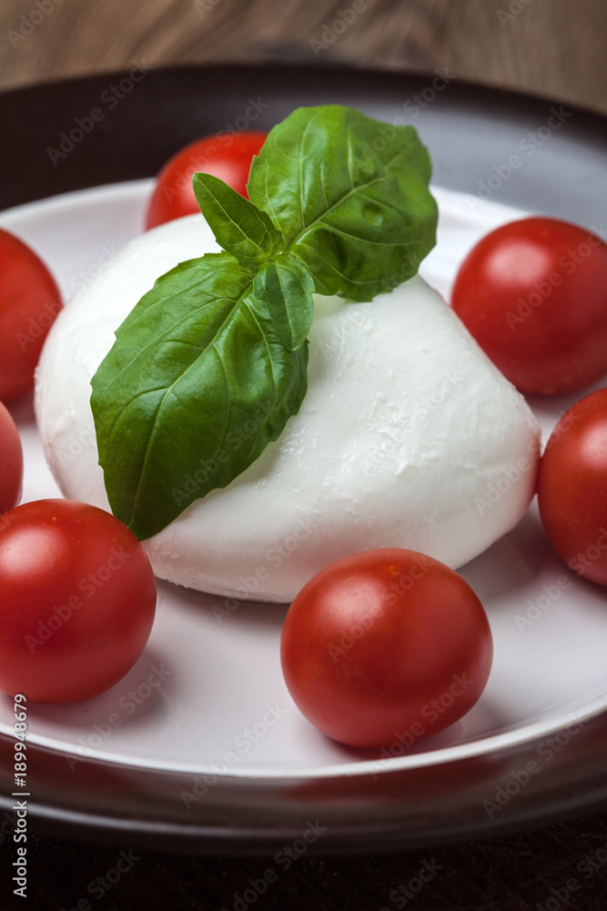 Mozzarella, tomato and basil. Mozzarella, tomato and basil.
