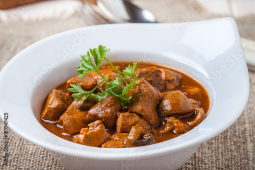 Goulash soup with pork and mushrooms.