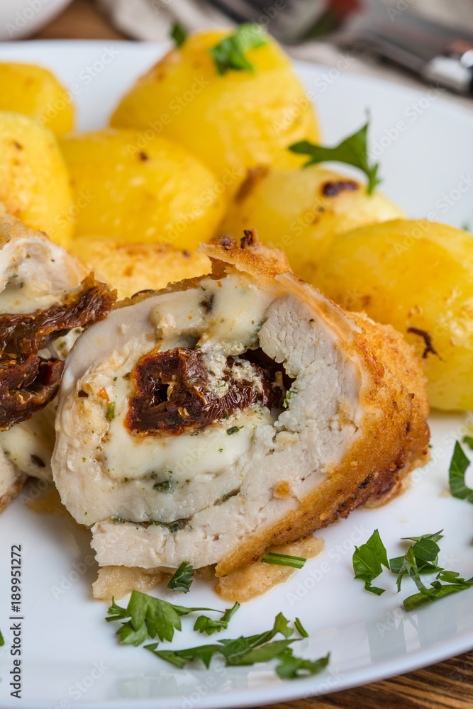 Chicken breast stuffed with cheese and dried tomatoes. Chicken breast stuffed with cheese and dried tomatoes.