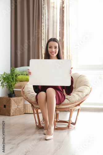 Beautiful young woman with ...