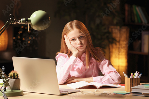 Teenage girl doing homework...