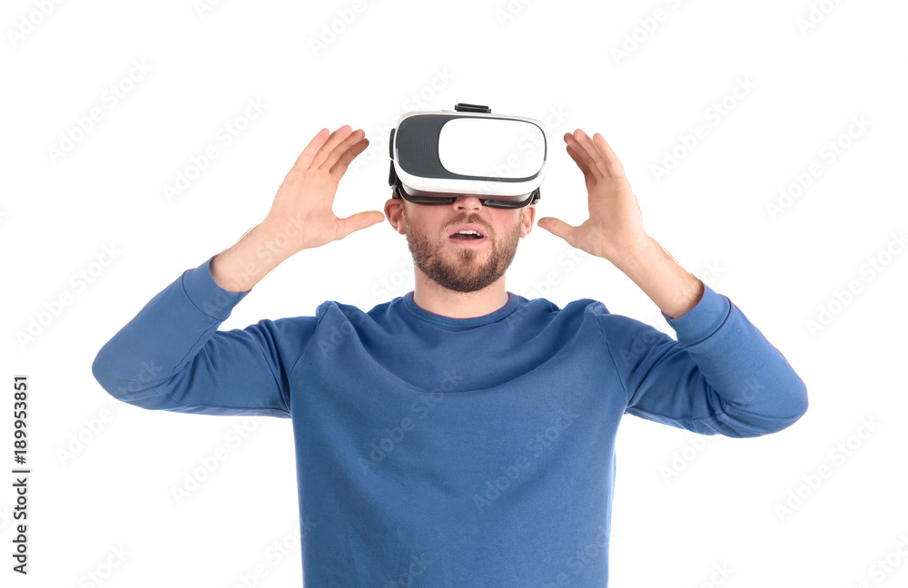 Emotional man with virtual reality headset on white background Emotional man with virtual reality headset on white background