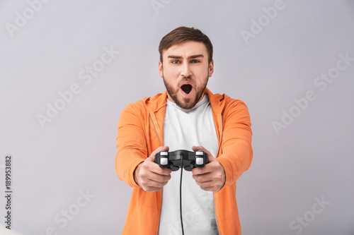 Emotional man with video ga...