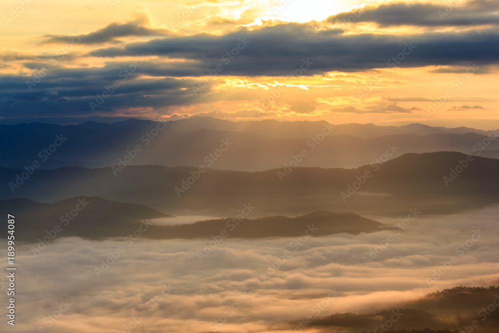 Sunbeam in the mountains and mist at at Doi Samer Dao, Nan Province, Thailand