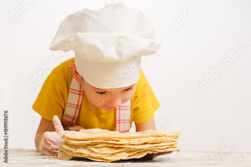 Child chef cook and Stack o...
