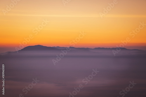 sunrise with fog on the Mountain in the morning
