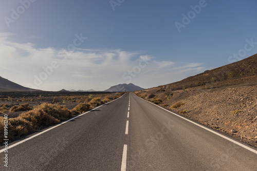 Empty Road with mountain in the horizon, Fuerteventura, Canary Islands