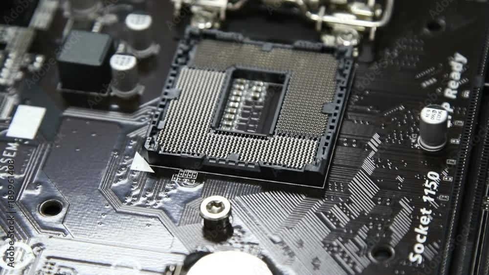 Extraction of the CPU from a motherboard socket. Extraction of the CPU from a motherboard socket.
