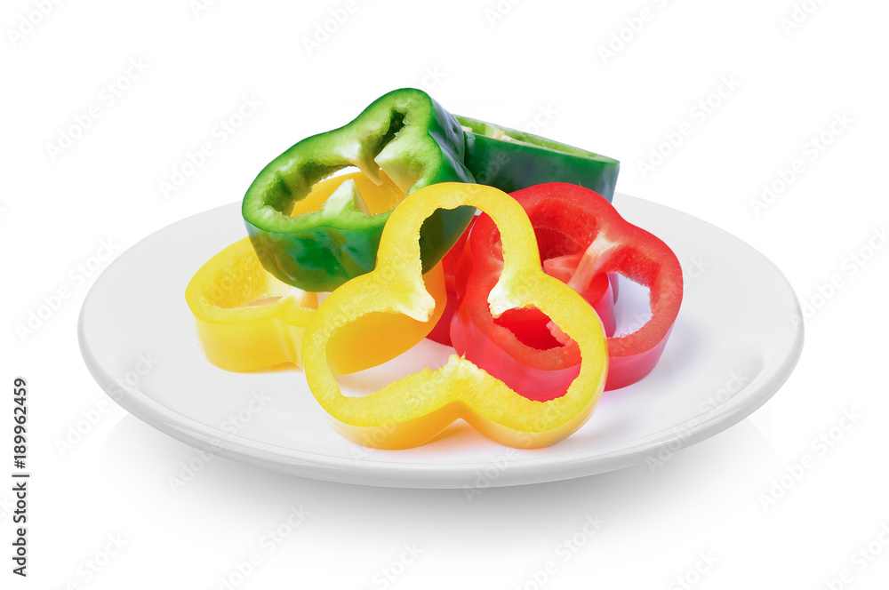 pepper slices in a plate on white background pepper slices in a plate on white background